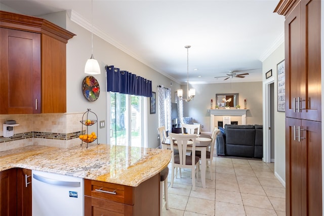 21 Coventry Ln, Smithtown, NY 11787 - kitchen featuring white dishwasher, backsplash, a ceiling fan, ornamental molding, and light stone counters