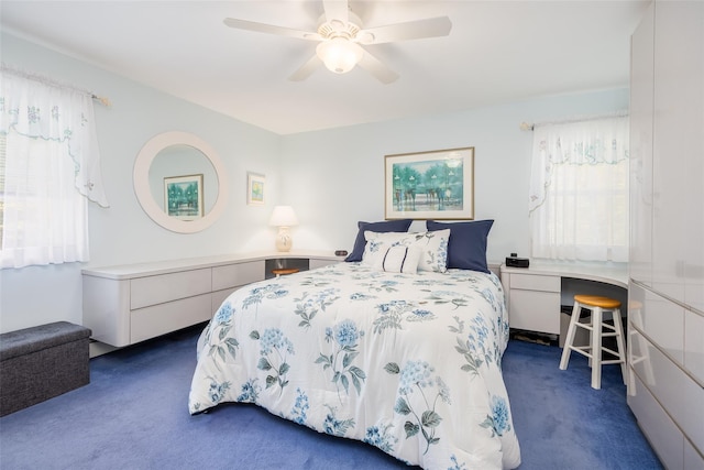carpeted bedroom featuring a ceiling fan