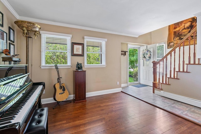 53 Irwin Pl, Huntington, NY 11743 - entrance foyer featuring hardwood / wood-style flooring, stairway, ornamental molding, and baseboards