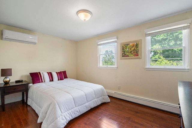 53 Irwin Pl, Huntington, NY 11743 - bedroom with baseboard heating, a wall mounted AC, and wood finished floors