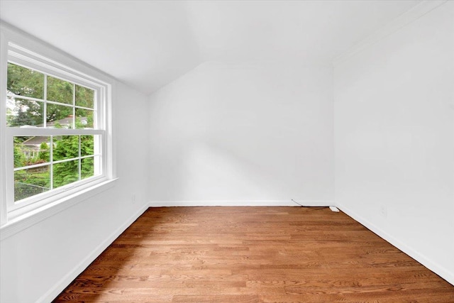 2356 Palmer Ave, New Rochelle, NY 10801 - empty room with lofted ceiling and wood finished floors