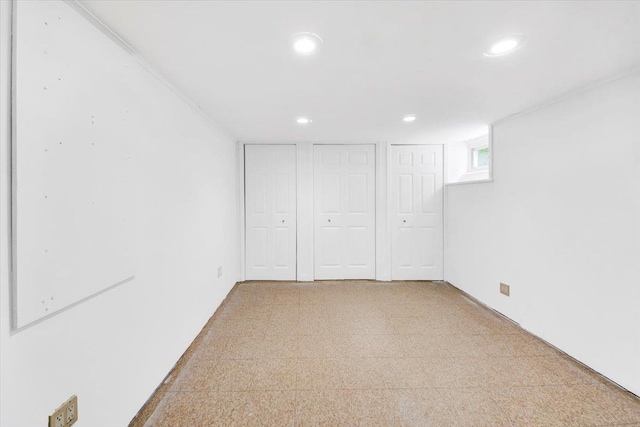 2356 Palmer Ave, New Rochelle, NY 10801 - unfurnished bedroom with recessed lighting, multiple closets, and carpet floors