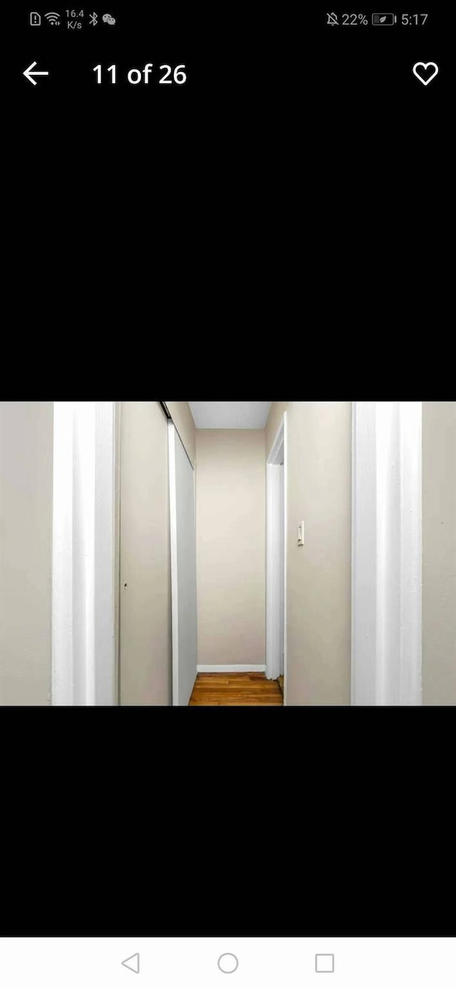 88-30 182nd St Unit 6F, Hollis, NY 11423 - hallway featuring wood finished floors