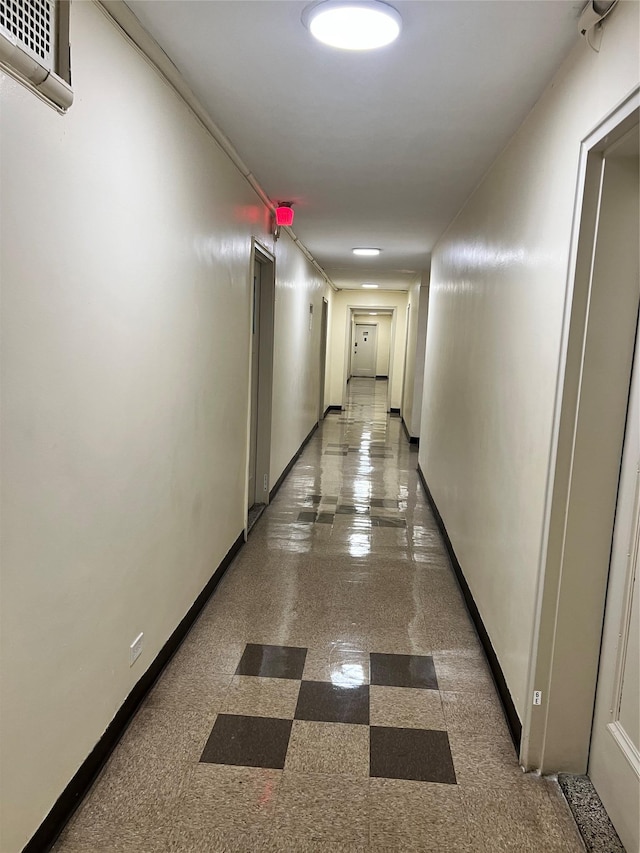 88-30 182nd St Unit 6F, Hollis, NY 11423 - corridor with a wall mounted AC and baseboards
