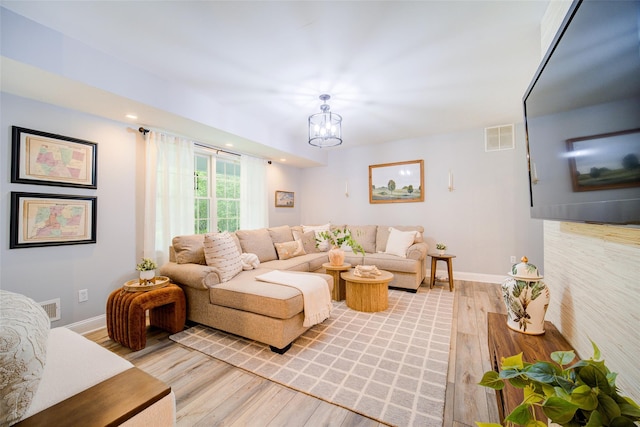 444 Haviland Hollow Rd, Patterson, NY 12563 - living room featuring light wood-style flooring, baseboards, recessed lighting, and a chandelier