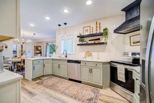 444 Haviland Hollow Rd, Patterson, NY 12563 - kitchen with stainless steel appliances, wall chimney range hood, a peninsula, a sink, and light countertops