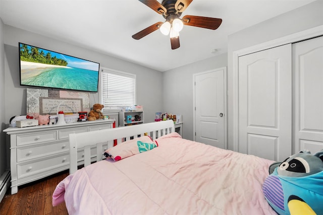 50 Old Dutch Hollow Rd, Monroe, NY 10950 - bedroom featuring a closet, dark wood finished floors, ceiling fan, and a baseboard radiator