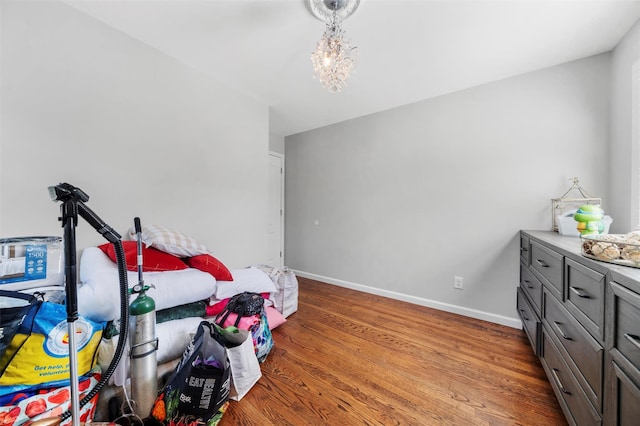 50 Old Dutch Hollow Rd, Monroe, NY 10950 - bedroom featuring light wood-type flooring and a chandelier