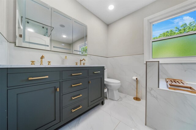 50 Old Dutch Hollow Rd, Monroe, NY 10950 - full bathroom with marble finish floors, vanity, tile walls, and a marble finish shower