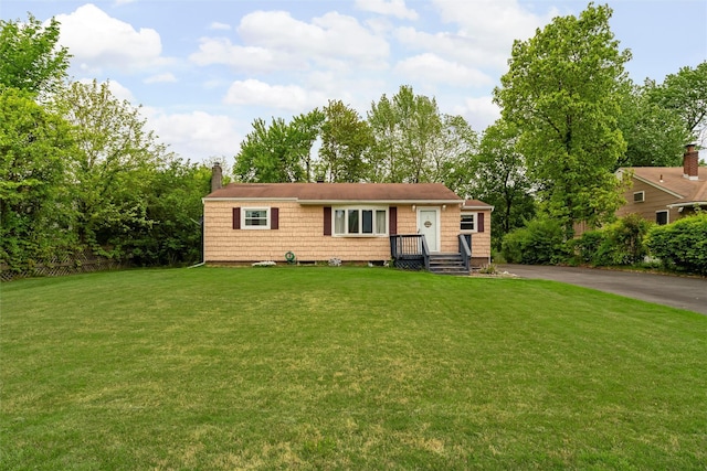21 James Rd, Monroe, NY 10950 - view of front of property featuring a front yard and a chimney