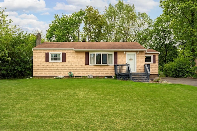21 James Rd, Monroe, NY 10950 - view of front of house with a chimney, a front yard, and a shingled roof
