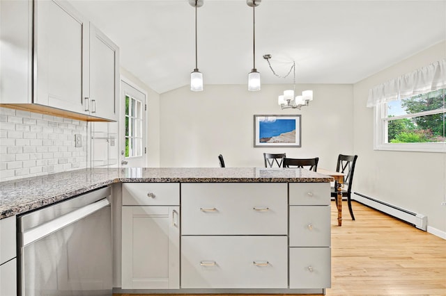21 James Rd, Monroe, NY 10950 - kitchen featuring stainless steel dishwasher, a baseboard heating unit, a peninsula, backsplash, and stone countertops