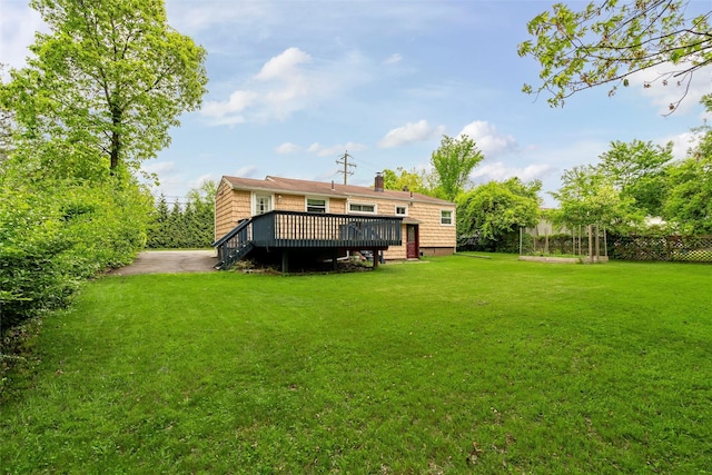 21 James Rd, Monroe, NY 10950 - back of house with a deck, a yard, and a chimney