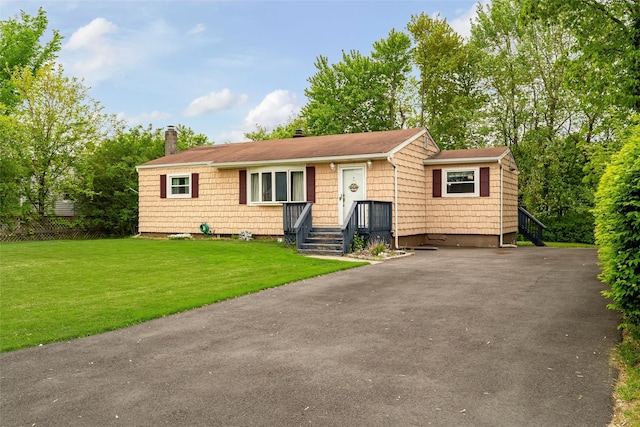21 James Rd, Monroe, NY 10950 - view of front of house featuring a chimney and a front lawn