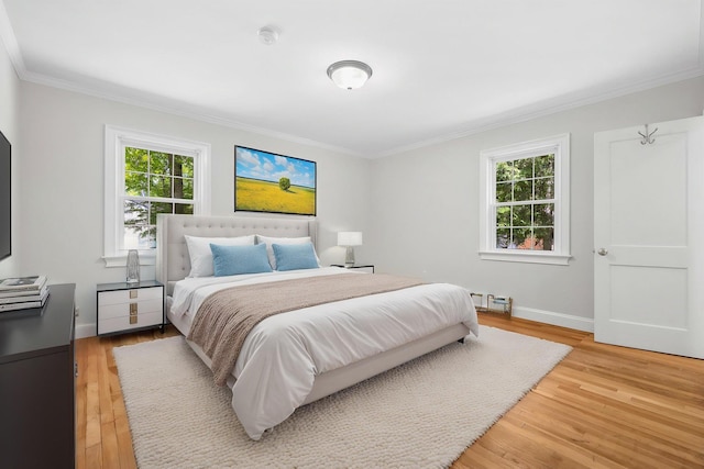 23 Entrance Way, Purdys, NY 10578 - bedroom with crown molding, multiple windows, light wood-style flooring, and baseboards