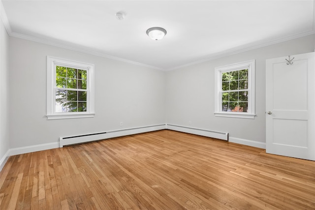 23 Entrance Way, Purdys, NY 10578 - unfurnished room with baseboard heating, healthy amount of natural light, light wood-style floors, ornamental molding, and baseboards