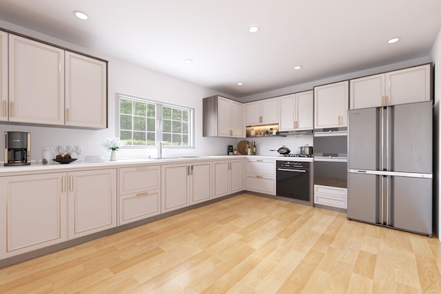 23 Entrance Way, Purdys, NY 10578 - kitchen featuring stainless steel appliances, a sink, light countertops, light wood-style flooring, and recessed lighting
