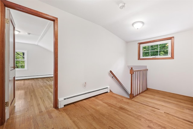 23 Entrance Way, Purdys, NY 10578 - stairs with a baseboard heating unit, baseboard heating, lofted ceiling, and wood finished floors