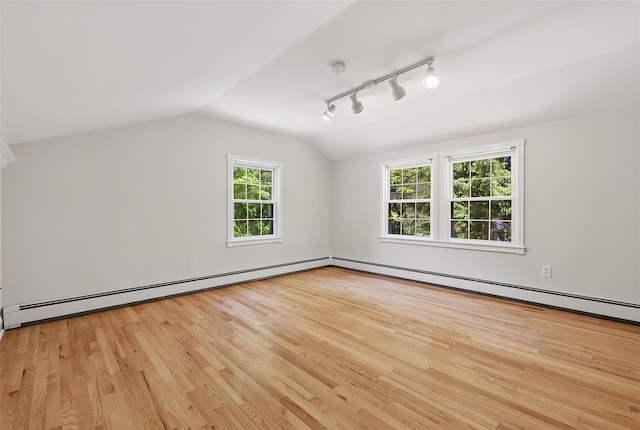 23 Entrance Way, Purdys, NY 10578 - additional living space featuring wood finished floors, lofted ceiling, and baseboard heating