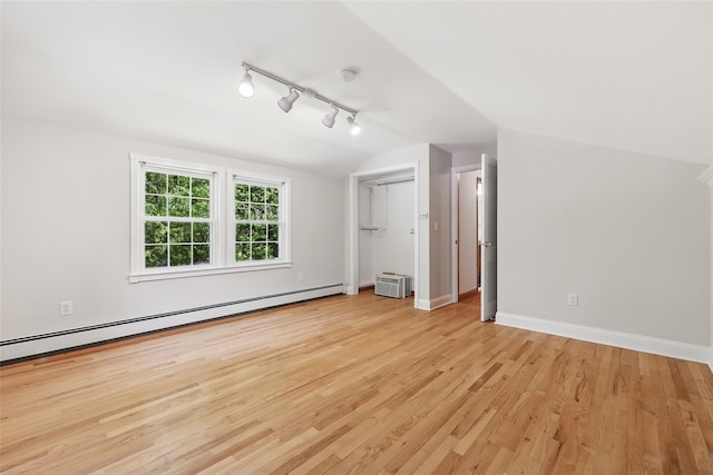 23 Entrance Way, Purdys, NY 10578 - bonus room with a baseboard radiator, light wood finished floors, vaulted ceiling, and baseboards