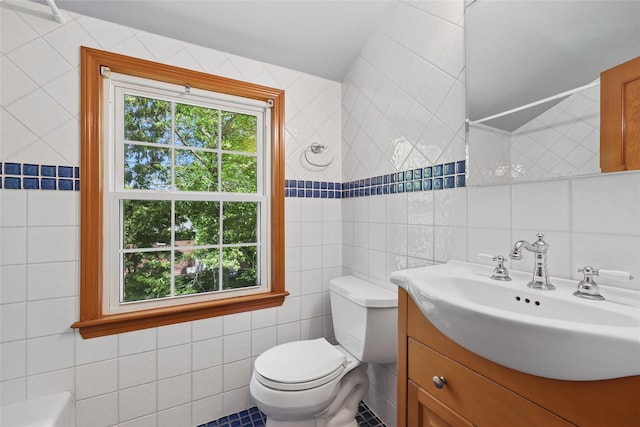 23 Entrance Way, Purdys, NY 10578 - full bathroom with tile walls, toilet, and vanity