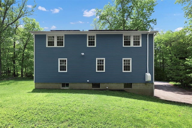 23 Entrance Way, Purdys, NY 10578 - rear view of house with a yard