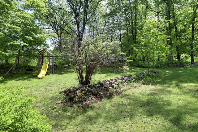 23 Entrance Way, Purdys, NY 10578 - view of green lawn with a playground