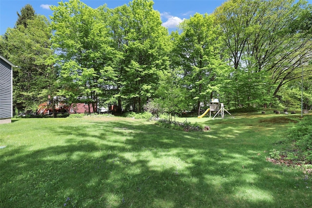 23 Entrance Way, Purdys, NY 10578 - view of grassy yard featuring a playground