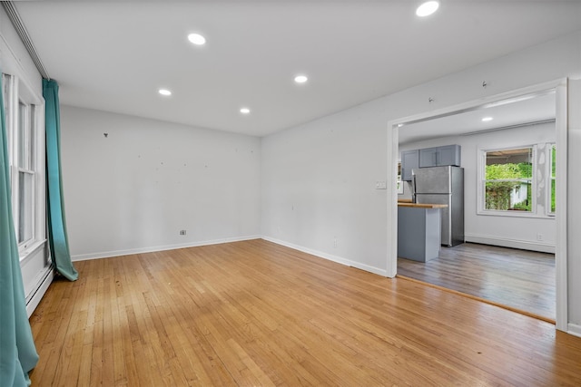 15 Scanlon Ave, Florida, NY 10921 - unfurnished room featuring a baseboard radiator, light wood-style flooring, recessed lighting, and baseboards