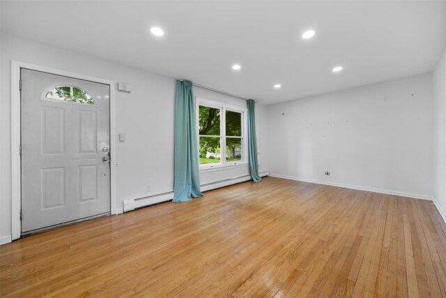 15 Scanlon Ave, Florida, NY 10921 - foyer with light wood-style flooring, plenty of natural light, recessed lighting, baseboards, and a baseboard radiator