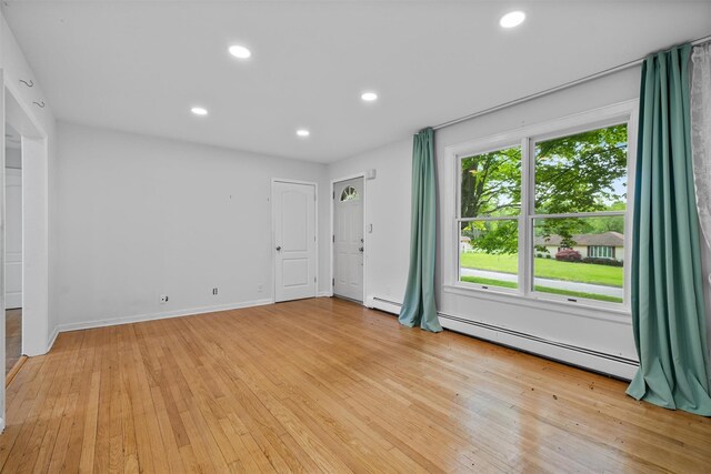 15 Scanlon Ave, Florida, NY 10921 - empty room featuring a baseboard radiator, light wood finished floors, recessed lighting, and baseboards