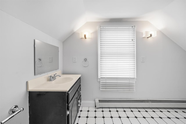 15 Scanlon Ave, Florida, NY 10921 - bathroom featuring vaulted ceiling, a baseboard radiator, vanity, and baseboards