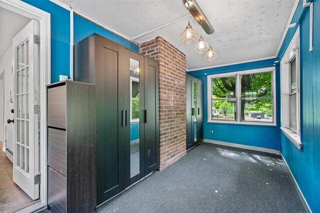15 Scanlon Ave, Florida, NY 10921 - spare room featuring carpet, baseboards, french doors, and brick wall