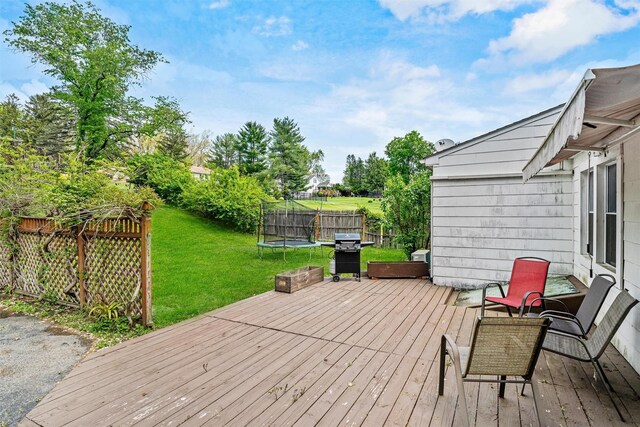 15 Scanlon Ave, Florida, NY 10921 - wooden terrace featuring a trampoline and grilling area