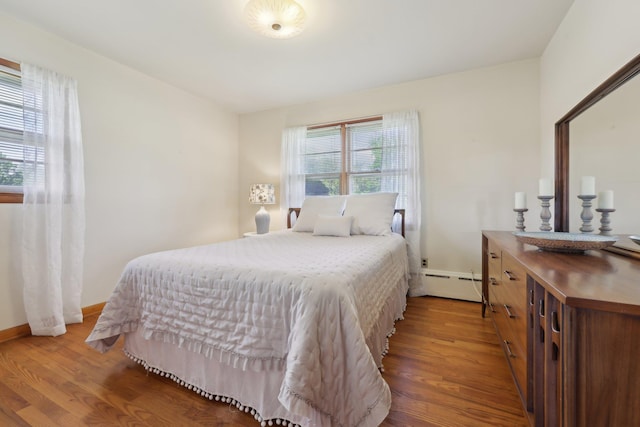 60 Rte 210, Stony Point, NY 10980 - bedroom with baseboard heating, wood finished floors, and baseboards