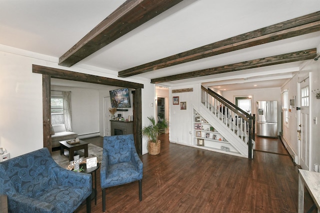 133 Spring Ln, Levittown, NY 11756 - living area with stairway, wood finished floors, baseboard heating, a fireplace, and beamed ceiling