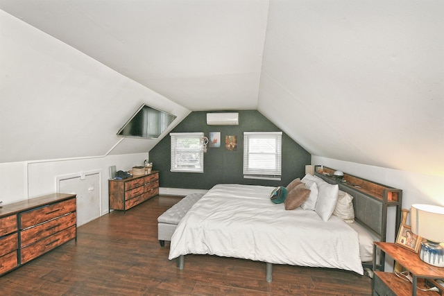 133 Spring Ln, Levittown, NY 11756 - bedroom featuring a wall mounted air conditioner, wood finished floors, and vaulted ceiling