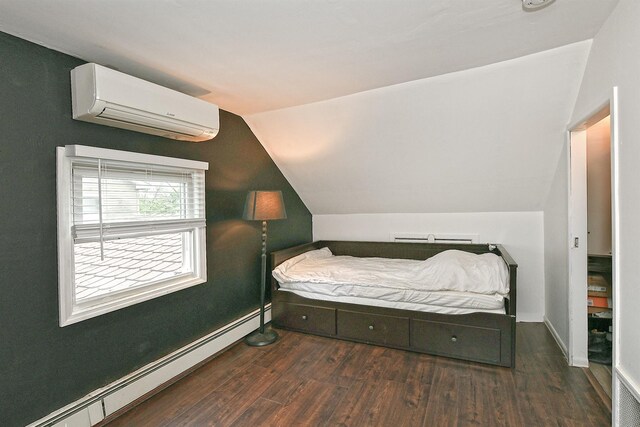 133 Spring Ln, Levittown, NY 11756 - bedroom featuring a wall mounted AC, baseboard heating, lofted ceiling, wood finished floors, and baseboards