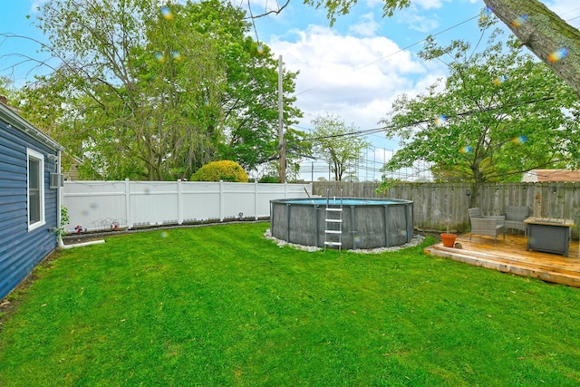 133 Spring Ln, Levittown, NY 11756 - view of yard featuring a deck