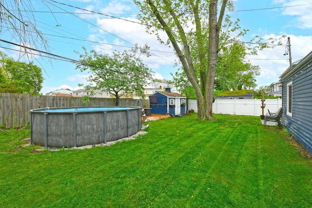 133 Spring Ln, Levittown, NY 11756 - view of yard featuring a storage shed and an outbuilding