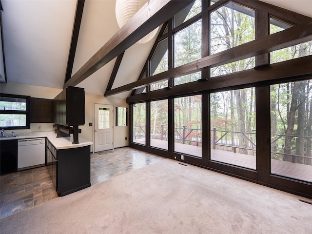 61 Reinhardt Rd, Middletown, NY 10940 - unfurnished living room featuring high vaulted ceiling, beam ceiling, and a sink