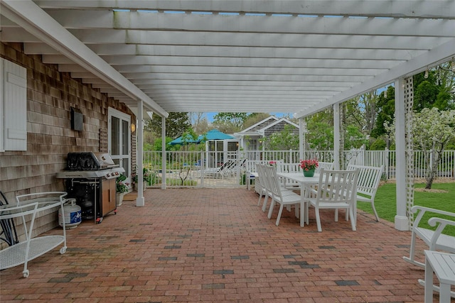 5A/5B Jessup Ln, Quogue, NY 11959 - view of patio featuring outdoor dining space, a pergola, area for grilling, and fence