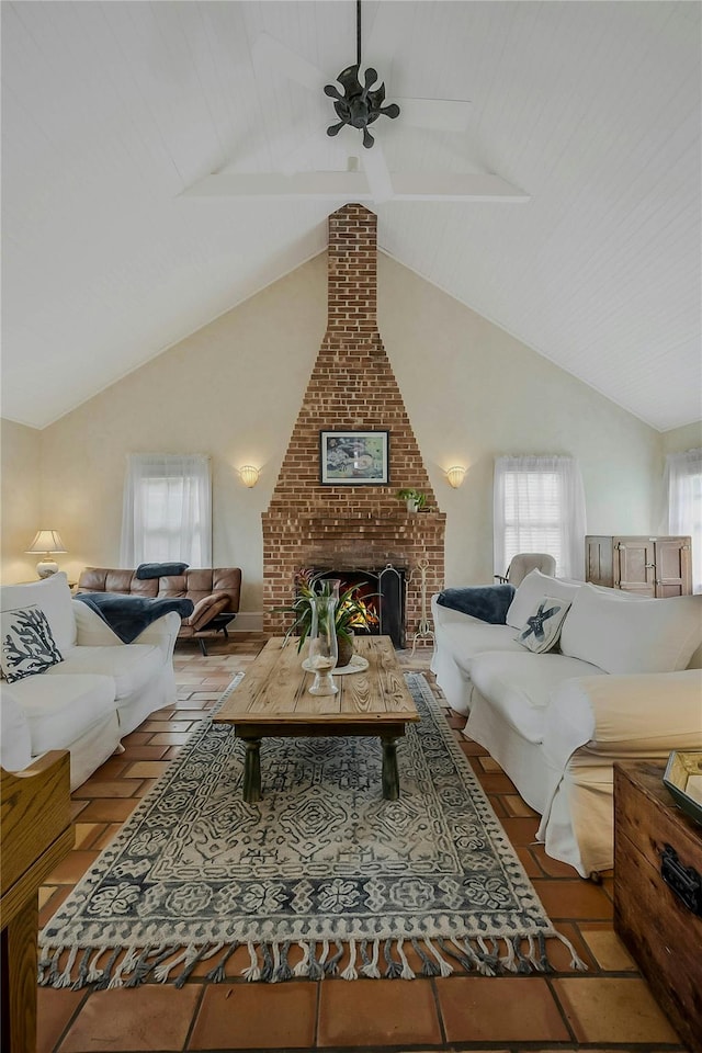 5A/5B Jessup Ln, Quogue, NY 11959 - living area featuring lofted ceiling, a brick fireplace, and ceiling fan