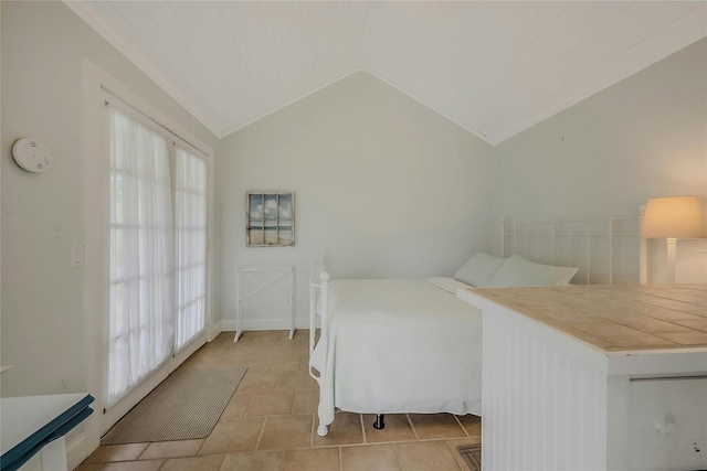 5A/5B Jessup Ln, Quogue, NY 11959 - bedroom featuring vaulted ceiling and light tile patterned floors