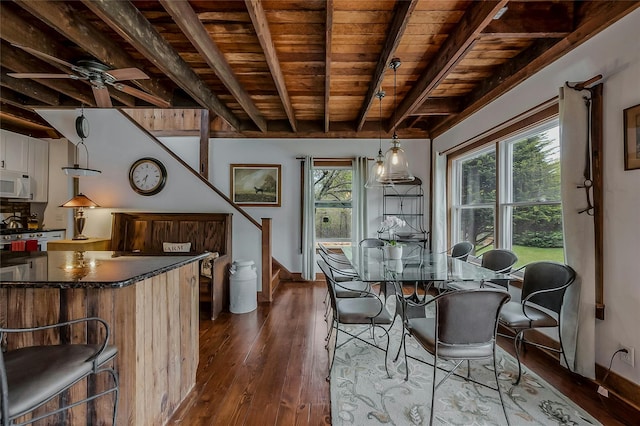 5A/5B Jessup Ln, Quogue, NY 11959 - dining area featuring wooden ceiling, beam ceiling, dark wood-type flooring, baseboards, and a ceiling fan