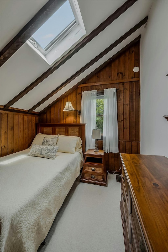 5A/5B Jessup Ln, Quogue, NY 11959 - bedroom featuring a skylight, wooden walls, and carpet floors