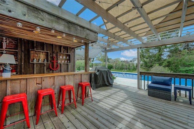 5A/5B Jessup Ln, Quogue, NY 11959 - wooden deck with an outdoor pool and area for grilling