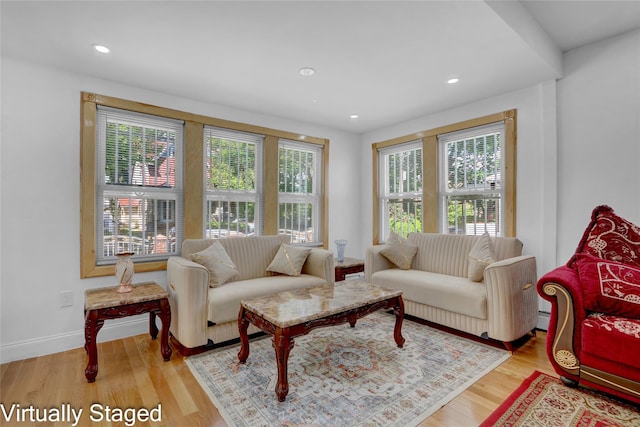 11511 173rd St, Addisleigh Park, NY 11434 - living area featuring wood finished floors, recessed lighting, and baseboards