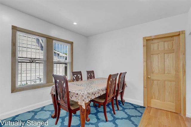 11511 173rd St, Addisleigh Park, NY 11434 - dining room featuring baseboards, wood finished floors, and recessed lighting