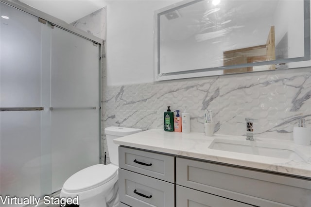 11511 173rd St, Addisleigh Park, NY 11434 - full bath with decorative backsplash, a stall shower, toilet, vanity, and tile walls